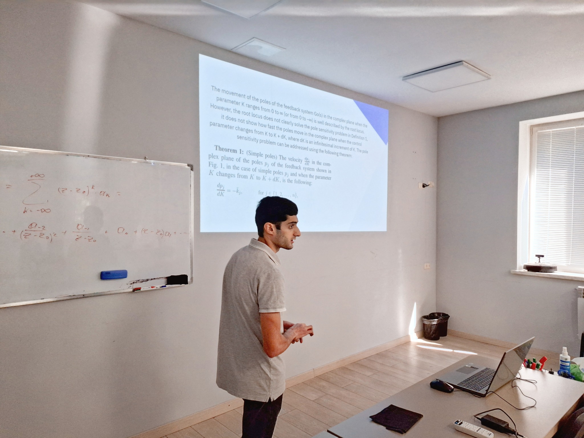 Seminar on Interpretation of Residues in the Partial Fraction Decomposition Applied to Pole Sensitivity Analysis and Root Locus Construction