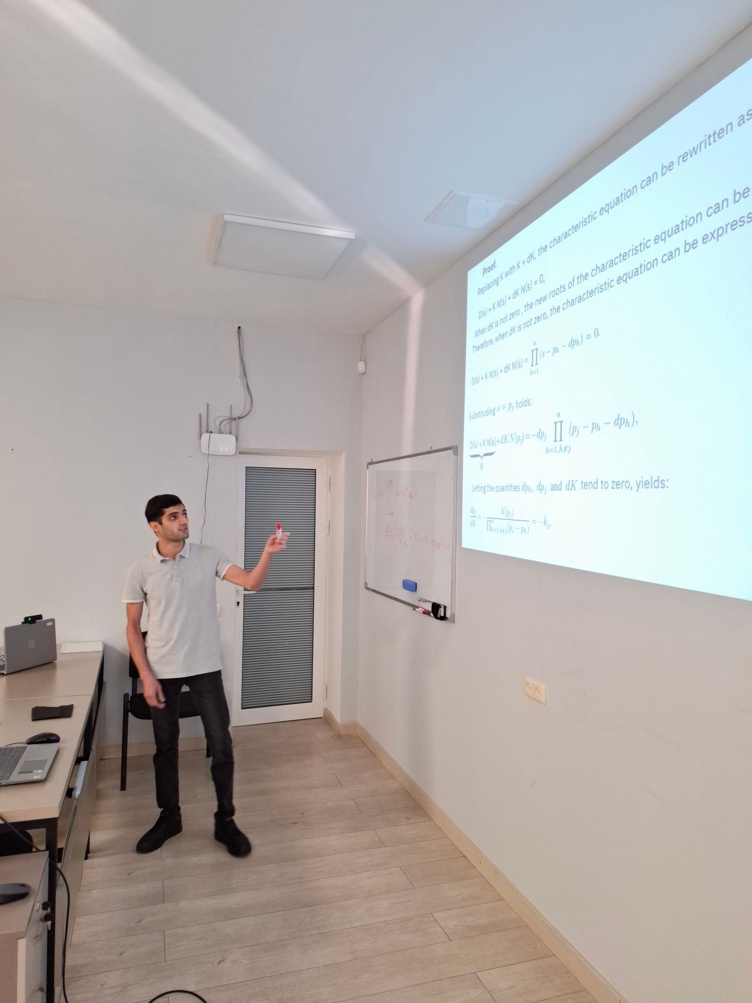 Seminar on Interpretation of Residues in the Partial Fraction Decomposition Applied to Pole Sensitivity Analysis and Root Locus Construction